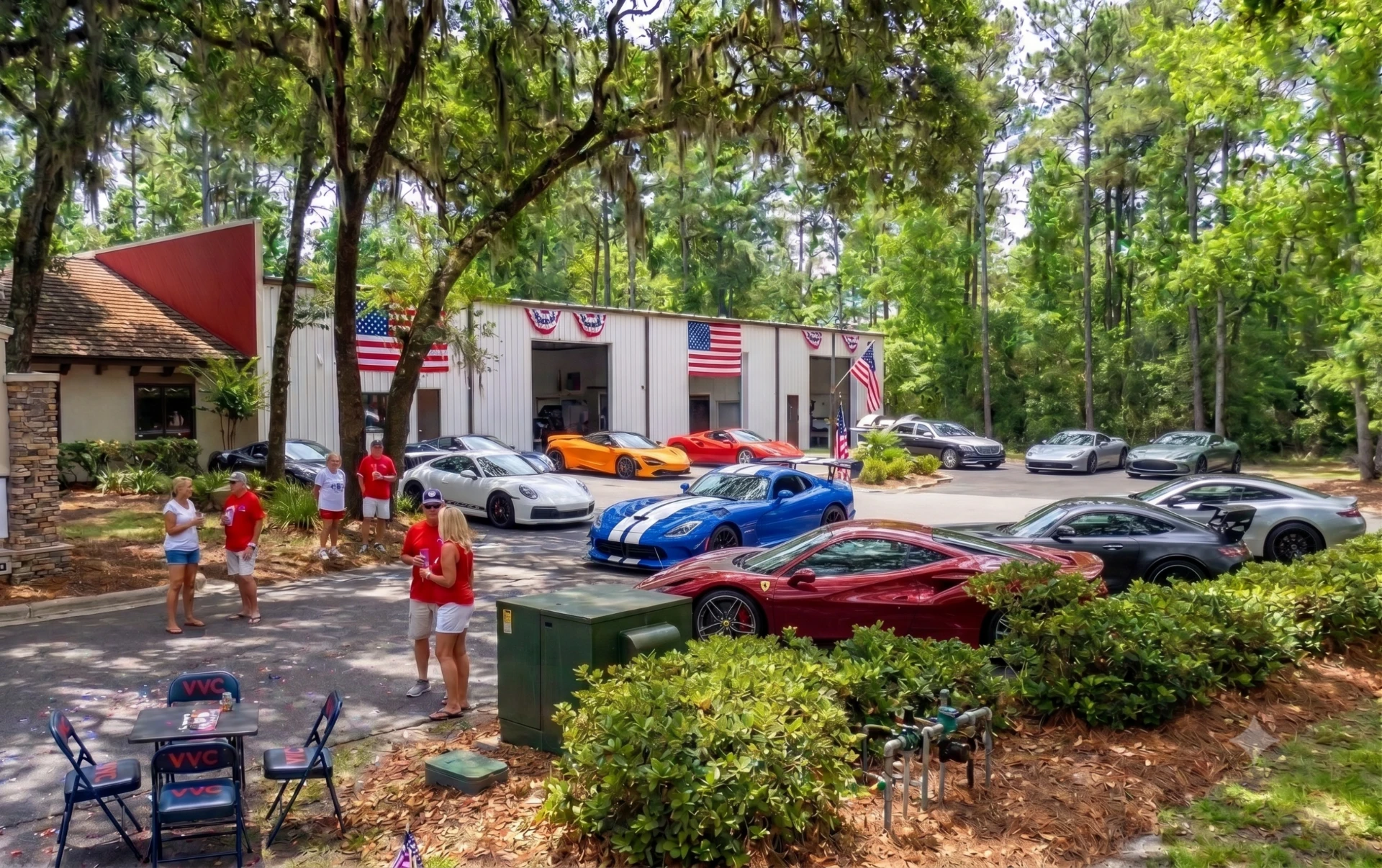 Exotic American muscle cars at Hilton Head Island marina with American flags and 4th of July fireworks sky